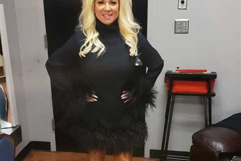 Long Island Medium Theresa Caputo, 55, shows off her toned legs in a skintight silver mini dress &..